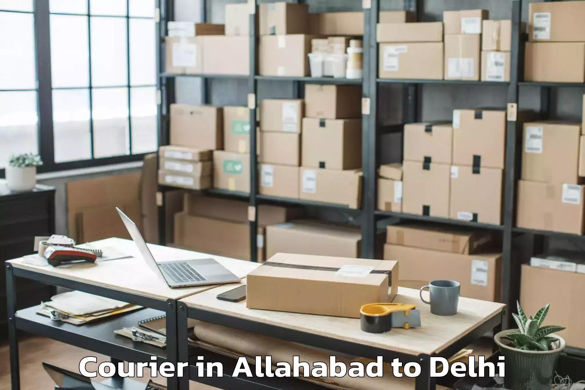 Leading Allahabad to Unity One Janakpuri Mall Courier Provider